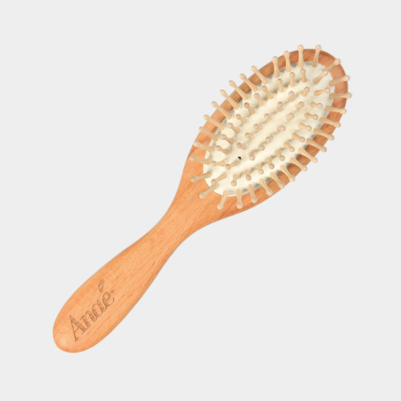 Petite brosse à cheveux picots en bois